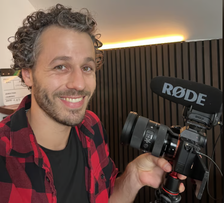 Gabe Bult holding his camera